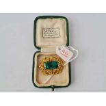 A GEORGIAN HIGHCARAT MALACHITE SET BROOCH BOXED