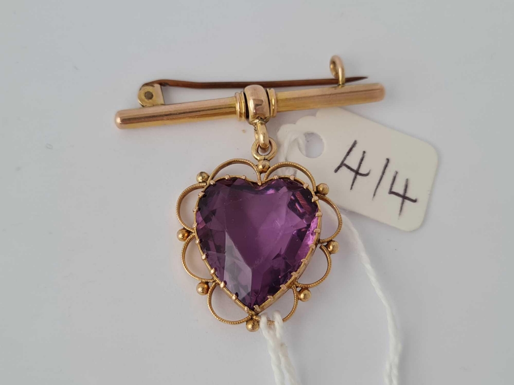 A heart shaped amethyst pendant on gold fob bar - 9 gms