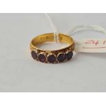 A Victorian flat cut garnet ring 22ct gold size P - 3.7 gms