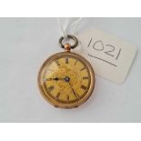 A ladies fob watch 9ct with gold coloured dial 35 gms inc