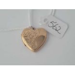 A floral engraved 9ct heart locket 3.8g inc