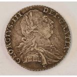 A George III silver shilling 1787