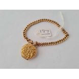 A ROSE GOLD BRACELET 9CT WITH ROLLED GOLD ATTACHED LOCKET