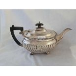 A Chester silver half fluted teapot on ball feet - 1919 - 675 g. all in
