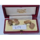 A boxed pair of oval cufflinks 9ct - 10.3 gms