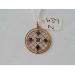 A circular amethyst pendant 9ct