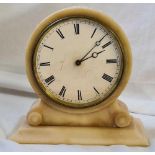 An alabaster cased clock with circular dial, the movements stamped VAP Reveter with dead beat