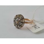 A ANTIQUE GEORGIAN PASTE SET OVAL CLUSTER RING SILVER SET WITH GOLD MOUNT AND SHANK SIZE O