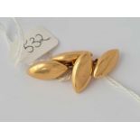 A pair of 15ct gold marquise shaped cufflinks 7g