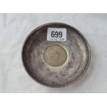 A circular silver mounted dish with Churchill crown to centre - 4" diameter