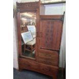 Art and Crafts oak wardrobe by LIBERTY & CO London with iron strapwork and a cut down bedside table