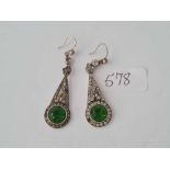 A good pair of silver and green stone drop earrings