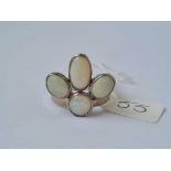 AN UNUSUAL 18CT WHITE GOLD RING SET WITH 4 GOOD OPALS size N 7.7g