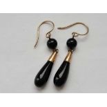 A pair of black drop 9ct earrings