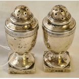 A pair of square base urn shaped pepper casters – 3” high – Birmingham 1925 by GU – 73 g.