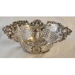 An Edwardian small fruit bowl pierced and embossed with masks, 8” wide – London 1901, 213g