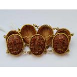 A 19TH CENTURY CHINESE HIGH CARAT GOLD CARVED PEACH NUT BRACELET