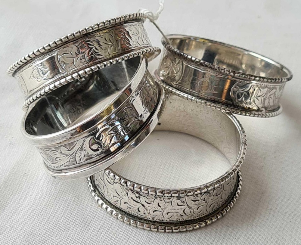 A pair of beaded edge napkin rings - Birmingham 1899 and two other similar - Image 2 of 2