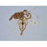 An art nouveau style sapphire and pearl pendant 9ct on a 9ct neck chain - 6.8 gms