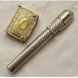 An unusual plated pen/pencil set which fits inside case and a book shaped plated vesta