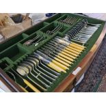 A OE PATTERN CANTEEN IN A TWO DRAWER TABLE CONTANING 12 TABLE FORKS 12 DESSERT FORKS 12 SOUP SPOON