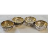 A set of four Victorian salts with chased bands and gilt interior – 2” wide – Sheffield 1880 by