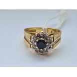 A sapphire and diamond ring 18ct gold size M1/2 - 5.6 gms