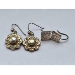 A pair of Victorian silver earrings and a metal pair