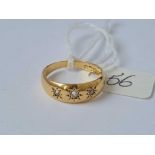An antique three stone diamond ring in 18ct gold with full hallmarks size N 4.3g