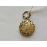 A gold cased Georgian memorial pendant with push in glazed compartment