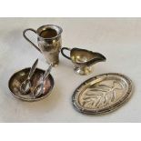 Four miniature sterling silver items – a mug, sauce boat etc.