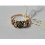 A antique fancy gold ring set with emeralds pearls and rubies size N - 2 gms