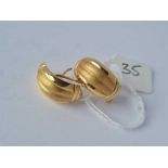 A pair of half shell 18ct gold earrings 4.1g