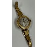 Vintage 18ct gold watch working . Gold plated bracelet