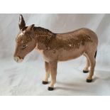 A Beswick figure of a standing donkey - 5" high