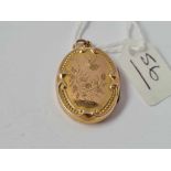 A good antique 9ct back and front bird locket