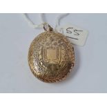 A large antique Victorian chased silver gilt locket 1879
