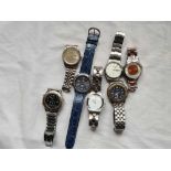 A bag of seven gents assorted wrist watches