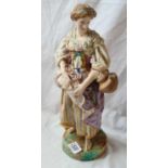 A decorative French figure of girl with picher - 13" high