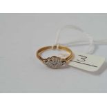 A oval cluster ring 18ct gold size M1/2