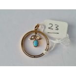 An circular gold turquoise & pearl pendant