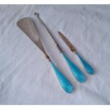 Three silver and enamel decorated items (button hook, shoe horn etc.)