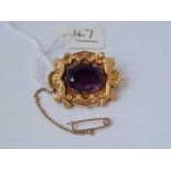 A Victorian ornate amethyst brooch set in gold - 8.3 gms