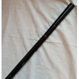 A sword in a black lacqueur case