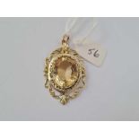 Antique Victorian citrine set in a scroll design mount. Tests as 15ct