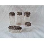 Five various embossed top jars with glass bodies - 1904 etc.