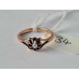 A small 9ct diamond solitaire size L