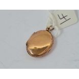 A oval 9ct back and front locket