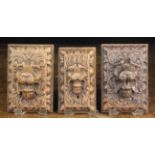 Three 17th Century Carved Oak Lion Mask Appliqués in egg & dart moulded borders,