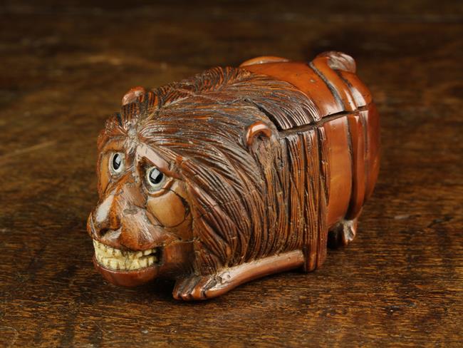 A Quirky 19th Century Coquilla Nut Snuff Box carved in the form of a dumpy,